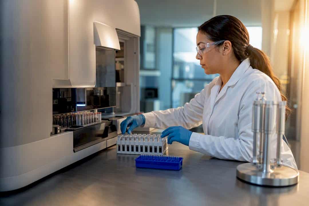 Technician Preparing Toxicology Specimens For Testing